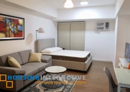 a spacious condominium in bgc