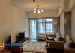 a cozy condominium in bgc