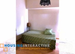 fully furnished 1-bedroom unit with balcony for rent in the trion towers