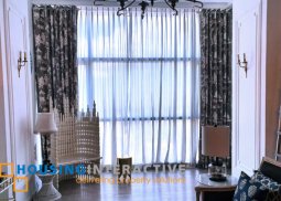 a fancy 2 bedroom unit semi penthouse in the shagri-la place