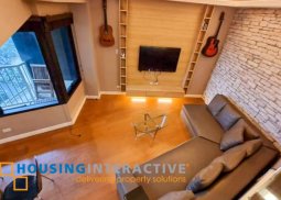 fully furnished 2-bedroom unit with balcony for rent in one rockwell