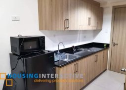 fully furnished 1-bedroom unit with balcony for sale in shore residences