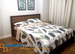 a 2 bedrooms with balcony in  proscenium residences in rockwell