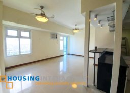 semi furnished 2br unit for sale at the trion towers