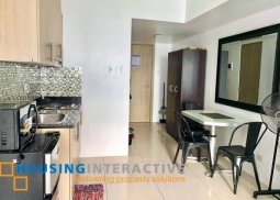 fully furnished studio unit with balcony for rent in breeze residences