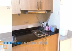 fully furnished 1-bedroom unit with balcony for rent in breeze residences
