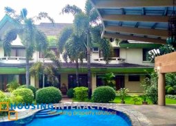 grand 10-bedroom house with pool for sale in heroes hill