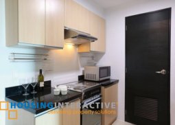 semi furnished 1br unit for lease in two serendra