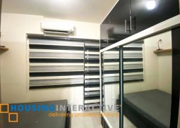fully furnished 1-bedroom unit with balcony for rent in breeze residences