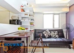 furnished 3-bedroom unit with balcony and timog view for sale in victoria station 1