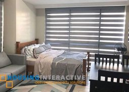 fully furnished studio unit with parking for sale in one eastwood
