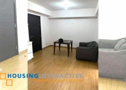 semi - furnished 2 bedroom unit for sale at acqua residences