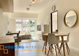 fully furnished 1-bedroom unit with balcony for rent in two serendra