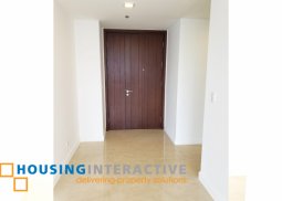 a semi-furnished 3br condominium unit for rent at the suites