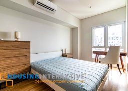 a semi-furnished 2br condominium unit for sale at two serendra