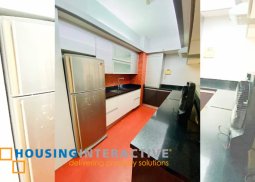 fully furnished 2-bedroom unit with balcony & parking for sale in one serendra