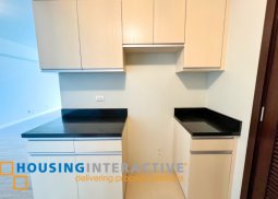 a semi-furnished 1br condominium for sale at kroma tower