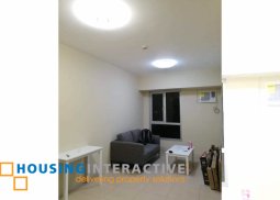 a semi- furnished 1 bedroom unit for rent at taguig