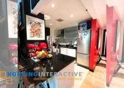 fully furnished 2-bedroom loft unit with parking for rent in one serendra