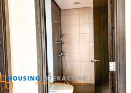 semi furnished 2-bedroom unit with parking for rent in one serendra