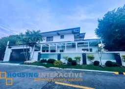 grand 2-storey, 7-bedroom house with parking for sale in bf homes