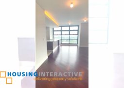 grand 2-bedroom unit with indoor balcony & parking for sale in garden towers