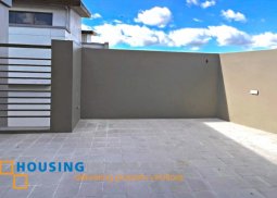 grand 5-bedroom duplex with roofdeck for sale in new manila