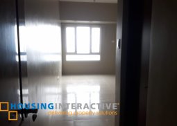 a fancy studio condominium in the heart of makati