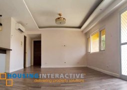 grand 2-bedroom unit with balcony & parking for sale in mckinley hill garden villas