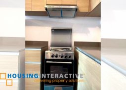 fully furnished 2-bedroom unit with balcony & parking for rent in the rise