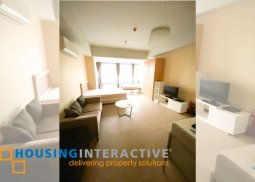 a semi-furnished studio unit for rent in two central