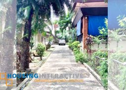 spacious lot with old house for sale in new manila