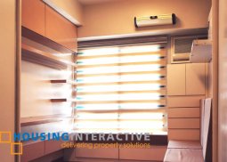 semi furnished studio unit for sale in flair towers