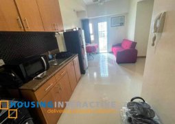 fully furnished 1-bedroom unit with balcony for rent in the trion towers