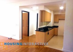 bare 2-bedroom unit with parking for sale in the veranda