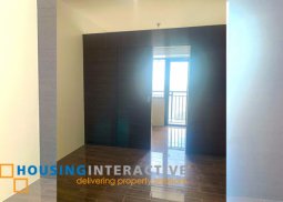 bare 1-bedroom unit with balcony for sale in air residences