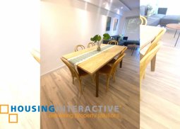 fully furnished 2-bedroom unit with balcony & parking for rent in tropical palms