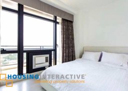 fully furnished 2-bedroom unit with balcony for sale in gramercy residences