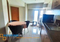fully furnished 1-bedroom unit with balcony for sale in trion towers