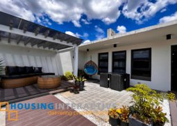 grand 4-storey, 4-bedroom townhouse with roofdeck & parking for sale in new manila