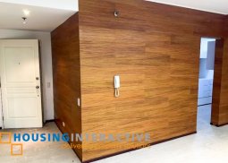 semi furnished 3-bedroom unit with parking for rent in two serendra