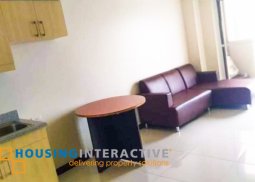 semi furnished 2-bedroom unit with balcony for rent in lumiere residences