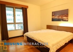 fully furnished 1-bedroom unit with balcony for rent in one serendra
