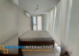 fully furnished 2-bedroom unit with balcony & parking for sale in three central