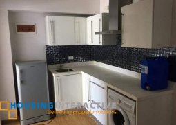 fully funished 2-bedroom unit with balcony in acqua private residences