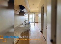 bare 1-bedroom unit with balcony & parking for rent in brixton place