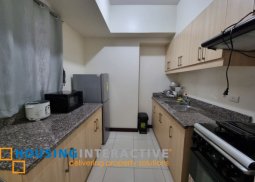 fully furnished 2-bedroom unit with balcony for rent in lumiere residences