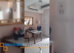 fully furnished 1-bedroom unit with balcony for sale in makati prime tower suites