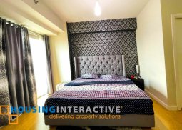 a delightful and palatial 2br condominium for sale at the grove