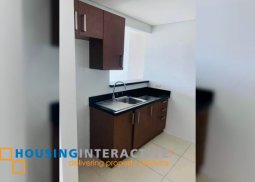 semi furnished 2-bedroom unit with balcony for rent in two serendra